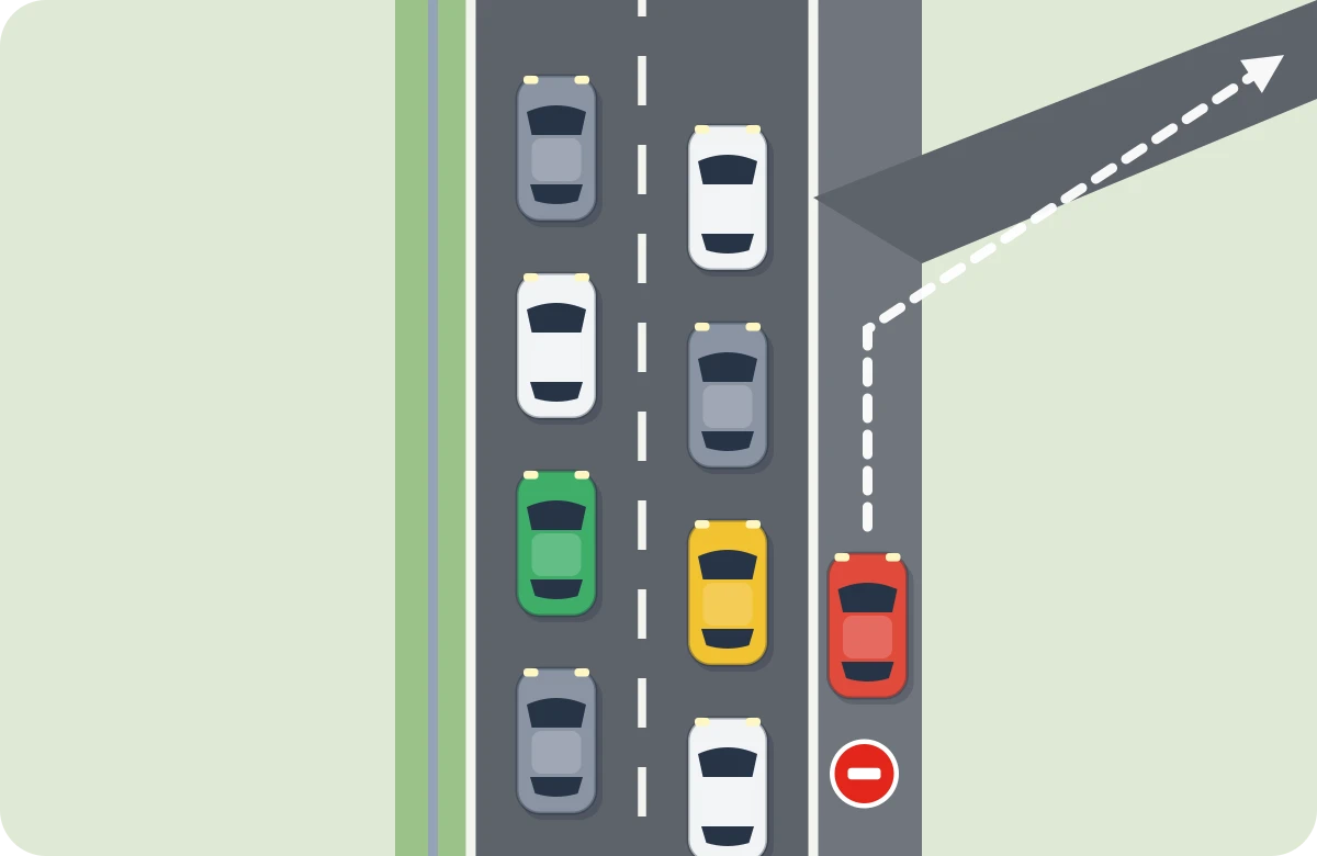 Atasco: el arcén no es carril. Aunque la salida esté cerca, se espera en el carril. El rojo que avanza por el arcén infringe.